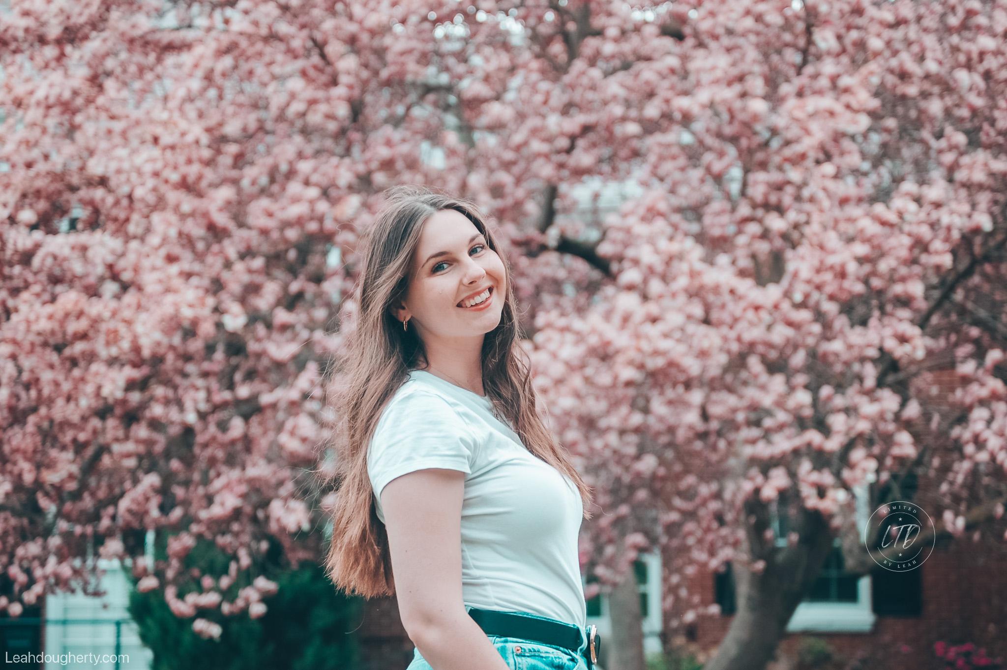 Leah outdoors among spring blossoms
